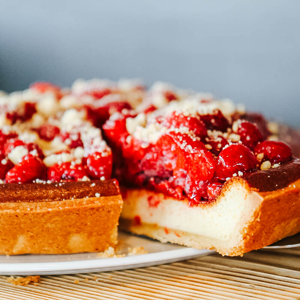 Kaesekuchen mit Himbeeren